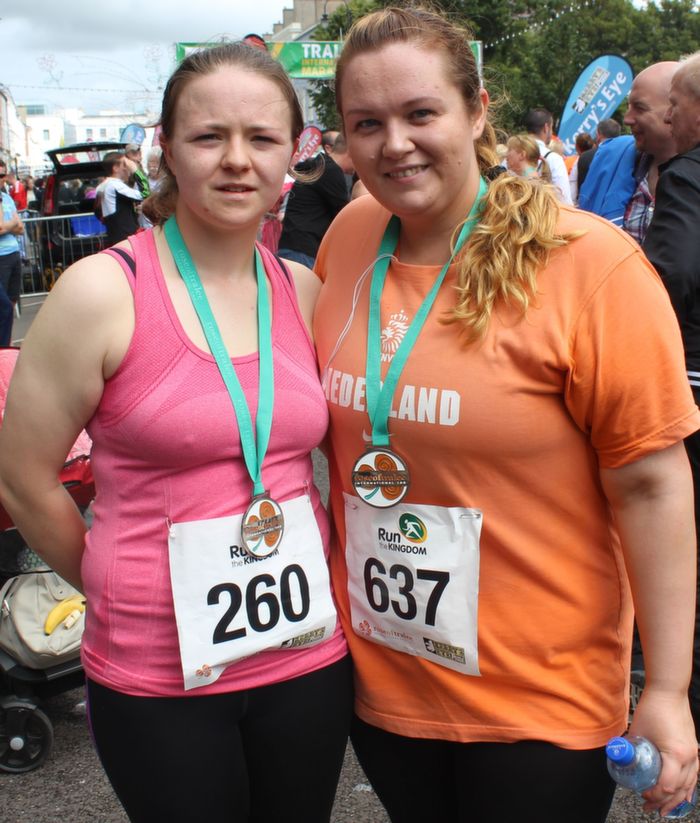 Fiona Griffin and Aoife O'Connor, Ballymac with their medals having completed the Rose Of Tralee 10k run at Denny Street on Sunday. Photo by Dermot Crean
