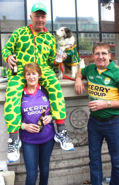 Dermot Walsh and Chico the Dog from Valentia Island with Eddie and Susan O'Neill, Cromane,  outside The Gresham before heading for Croke Park on Sunday. Photo by Dermot Crean