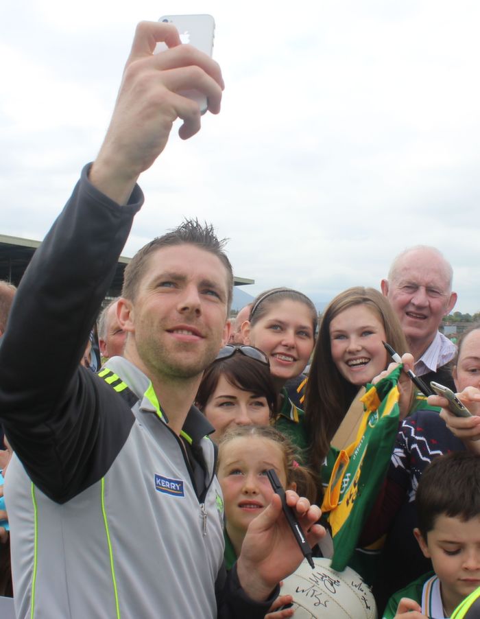 Marc O Sé takes a selfie on Niamh Sheehan of Farranfore's phone at the Kerry Supporters Open Day at Fitzgerald Stadium on Saturday. Photo by Dermot Crean