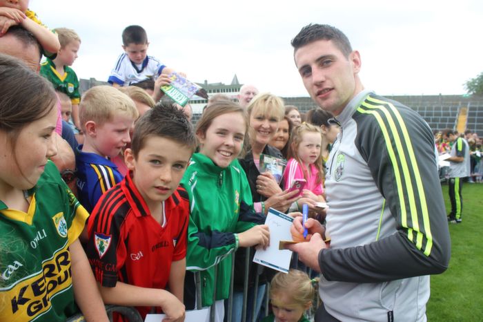 Zac OShea, Kenmare, Ciara and Helena Randles, Killarney, with Kerry star Paul Geaney at the Kerry Supporters Open Day at Fitzgerald Stadium on Saturday. Photo by Dermot Crean
