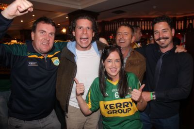 David Moriarty, Donal Horgan, Morgan Stack, Paul Crean and unknown photobomber in front at the Kerry after-match function in the Ballsbridge Hotel on Sunday night. Photo by Dermot Crean