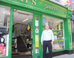 Ciaran Hennebery of Hennebery's Sports on Ashe Street which is all decked out in green and gold for the All-Ireland final on Sunday week. Photo by Dermot Crean