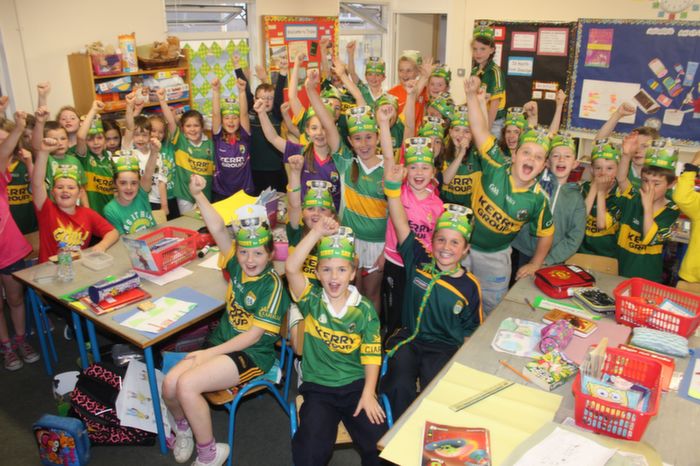 Pupils from Listellick National School show off the green and gold for their 'Jersey Day' on Friday. Photo by Gavin O'Connor. 