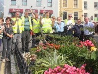 Marking Tralee's retention of their Tidy Towns Gold Medal at Denny Street on Tuesday afternoon were Mayor of Tralee, Jim Finucane with Tralee Tidy Towns Kit Ryan, Anne Connolly, Tommy McDonnell, Richard Moloney, Pat Galvin, Terry Nammock, Josephine Griffin, Mary O'Brien, Danny Moynihan, Brendan Murphy and John Griffin, Tourism Officer with Kerry County Council. Photo by Dermot Crean