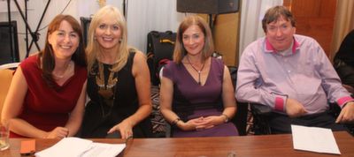 The judging panel, Katie Hannon, Deirdre Walsh and Terry O'Brien with host Miriam O'Callaghan at the 'Kerry GAA Stars Lovely Legs Competition' at the Fels Point Hotel on Saturday night. Photo by Dermot Crean