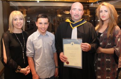 Brian Clarke who won the Monex Student of the Year as he qualified with a Bachelor of Science in Software Development degree with his family Katie, Adam and Leah, Milltown, at the IT Tralee graduation ceremony on Friday. Photo by Dermot Crean