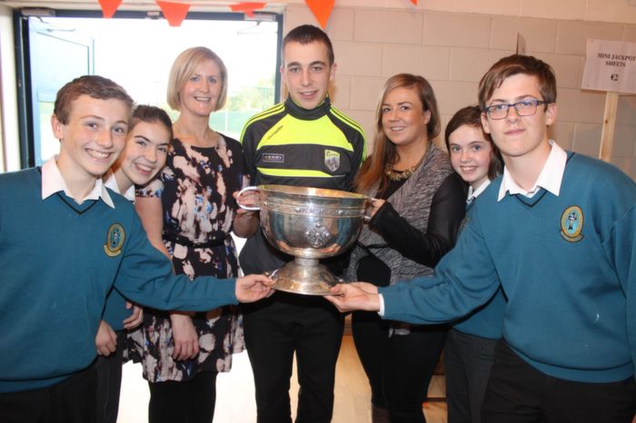 Andrew Barry and the Tom Markham Cup, with staff and students of Mercy Mounthawk. Sean Gannon, Katie Crowe, Sinead Muldoon, Lindsey Moriarty, Aideen Fox and Tadgh Hurley. Photo by Gavin O'Connor.  