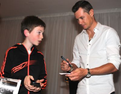  Nicholas Roche, signs an autograph for a fan in Fels Point, for a LifeLife Foundation event. Photo by Gavin O'Connor. 