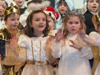 Pictured giving it their all at Blennerville National School's Christmas Carol Service held in St. John's Church on Tuesday evening were junior infants, Eve O'Sullivan and Katelyn Laide. Photo by Pauline Dennigan