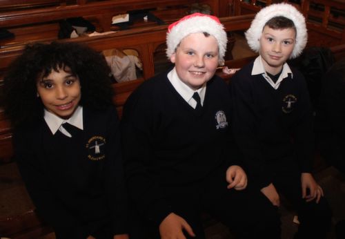 Jaden Efegbare, Nathan Moriarty O'Shea and Dylan Moriarty at the Blennerville NS Christmas Concert at St John's Church on Tuesday evening. Photo by Dermot Crean