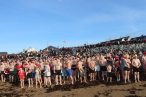Lining up for the Christmas Day Swim in Fenit. Photo by Dermot Crean