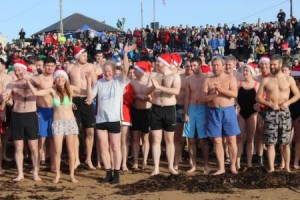Lining up for the Christmas Day Swim in Fenit. Photo by Dermot Crean