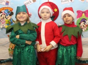 Little elves and Santa, Nicholas Browne, Hugo Loggins and Aidanas Piesina before the Moyderwell Christmas Concert on Friday morning. Photo by Dermot Crean