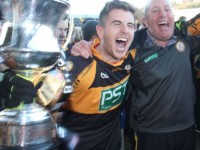 David and Ger Mannix celebrate with the new addition to the trophy cabinet at Connolly Park. Photo by Dermot Crean
