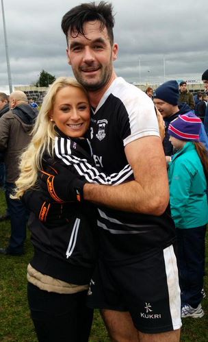John Dowling, with girlfriend Ursella O'Keeffe  after the final whistle on Sunday in Portlaoise. 