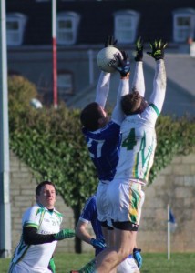 Kerins O'Rahilly's, John C O'Connor rises high to claim the ball over John Mitchels, George Bastible. Photo by Dermot Crean.