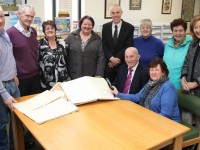 At the handing of the Ballyroe School roll books to Kerry County Library were back, from left: Micheal Lynch, John King, Marian Fitzgerald, Kay McGillycuddy, Tommy O'Connor, Peggy Geary, Angela Kirby and Marie McSweeney. Front: Denis Walsh and Margaret Murphy.