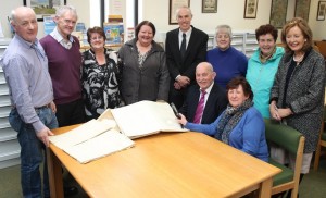 At the handing of the Ballyroe School roll books to Kerry County Library were back, from left: Micheal Lynch, John King, Marian Fitzgerald, Kay McGillycuddy, Tommy O'Connor, Peggy Geary, Angela Kirby and Marie McSweeney. Front: Denis Walsh and Margaret Murphy.