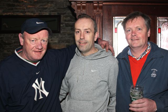 Enjoying the Cheltenham Festival at the Castle Bar were, from left: Tom, Tim and Junior Foley. Photo by Gavin O'Connor.