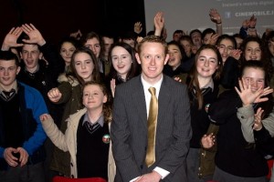 Colm Cooper with students of Gaelcholaiste Chiarraí at the Cinemobile at the Fels Point Hotel on Thursday. Photo by Oscar Brophy