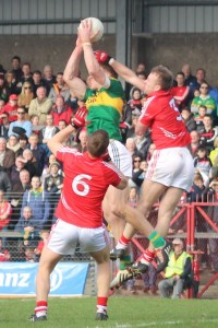 Tommy Walsh rises high against Cork. Photo by Gavin O'Connor.
