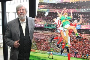 Dr Jim O'Sullivan with the painting 
