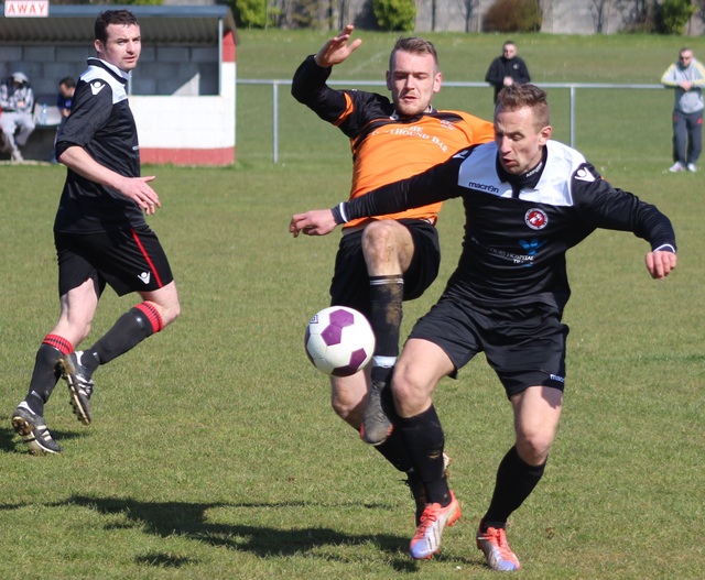 Dynamos striker, Gintaras Paketuras, was closey marshaled by the Park defence. Photo by Gavin O'Connor.  