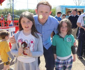 Ava Jane and Ted Fitzgerald with Colm 'Gooch' Cooper at the Ballyseedy BBQ Fun Weekend event on Saturday. Photo by Dermot Crean