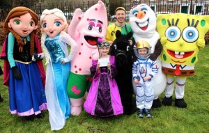Two of the three winners of Fancy Dress Competition, Rachel O'Connor and Darragh Murphy with characters at the Meadowlands Hotel Kids Fun Run at the Town Park on Saturday afternoon as part of the Tír Na nÓg Festival. Photo by Dermot Crean
