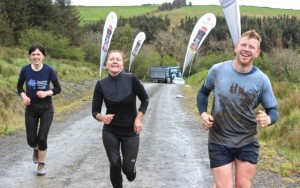 Joanne Fitzgerald, Anne Brosnan and Gary Normoyle finishing the BWildered Challenge last year. Photo by Dermot Crean