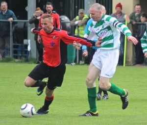 Gintaras Paketuras, in possession for Dynamos in the Munster Junior Cup final against Carrick United in Mounthawk Park on Sunday. Photo by Gavin O'Connor.  