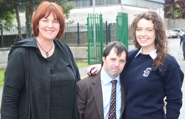 Cliodhna Maguire, Mike Hussey and Mary Kate Maguire after the Presentation Secondary School Graduation on Friday. Photo by Gavin O'Connor