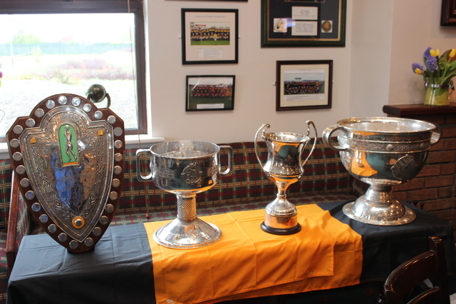 Plenty of silverware was on display, from left, the County League, Bishop Moynihan Cup, Munster Cup and the Sam Maguire Cup. Photo by Gavin O'Connor. 