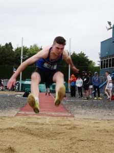 Winner of the Minor Boys Long Jump competition, Sean Quilter, from Tralee CBS in action. Photo by Adrienne McLoughlin.