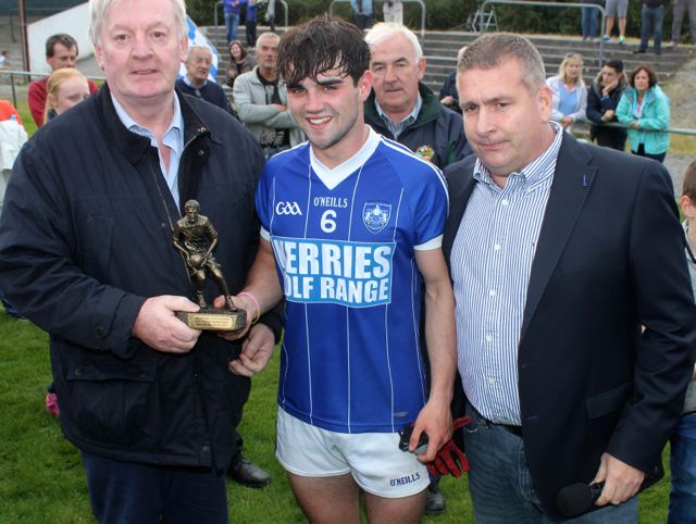 Cormac Coffey, is presented with his man of the match. Photo by Dermot Crean. 