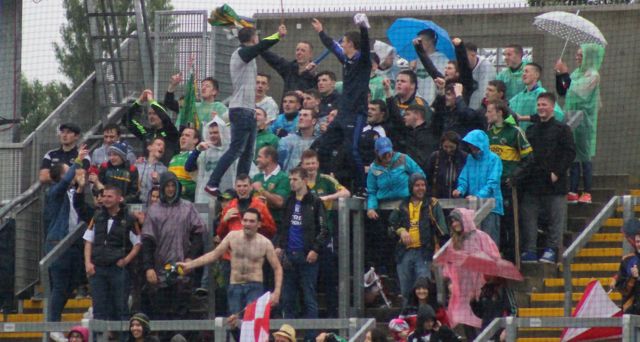 Singing in the rain. Kerry fans rejoice on the Hill at the final whistle. Photo by Dermot Crean. 