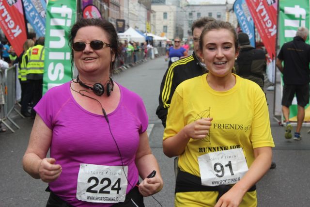 Two ladies make it home after running the Rose of Tralee 10k on Sunday morning. Photo by Dermot Crean