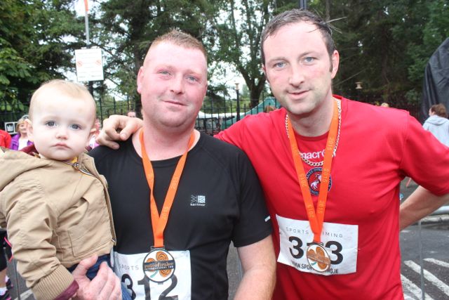 Jack and David Carmody with Anthony Murphy who was running for his daughter Róisín, who was born on Saturday, after running the Rose of Tralee 10k on Sunday morning. Photo by Dermot Crean
