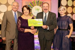Noreen O’Sullivan from Killarney, Co. Kerry has won €30,000 including a holiday to the Greek Islands on last Saturdays (1st August 2015) National Lottery Winning Streak game show on RTE.  Pictured here at the presentation of the winning cheques were from left to right: Marty Whelan, Winning Streak game show co-host; Noreen O’Sullivan, the winning player; Peter Plunkett, Head of IT at the National Lottery who made the presentation and Sinead Kennedy Winning Streak game show co-host. The winning ticket was bought from Kearney’s Centra, Ballydesmond, Mallow, Co.Cork. Pic: Mac Innes Photography.