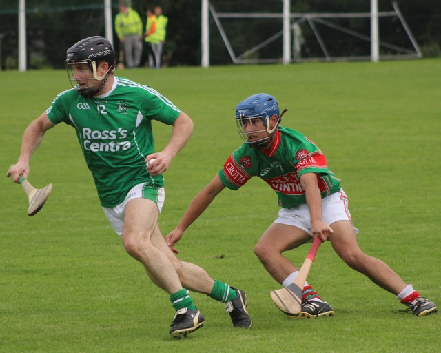 Ballyduff's Bobby O'Sullivan and Crotta's Adrian O'Mahony in action during the match on Tuesday night. Photo by Gavin O'Connor