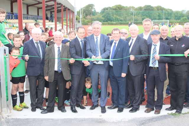 Martin O'Neil and John Delaney cut the ribbon. Photo by Galvin O'Connor. 