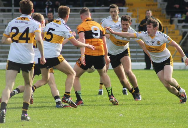 Austin Stacks, Greg Horan is surrounded by Dr Crokes players. Photo by Dermot Crean. 