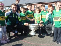 Andrew Barry and Jack Morgan with some of the Gaelscoil Mhic Easmainn junior pupils. Photo by Gavin O'Connor.