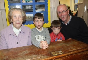 The oldest surviving past pupil Mary Daly with grandchildren Rory and James, and son Sean at the launch of 'Blennerville School And Community - A Story Worth Telling' at the school on Saturday. Photo by Dermot Crean