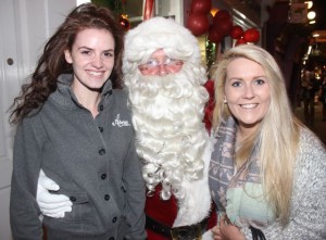 Santa Claus meets Brenda Foley and Liz Clancy from Ballybunion at the CH Chemists Customer Night on Friday. Photo by Dermot Crean