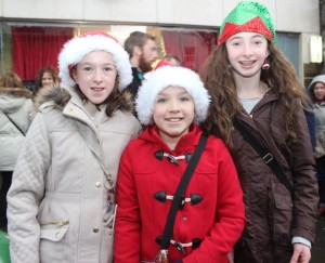 Laura and Leah Moynihan and Clodagh O'Keeffe at the CH Chemists' Santa Parade on Saturday. Photo by Dermot Crean