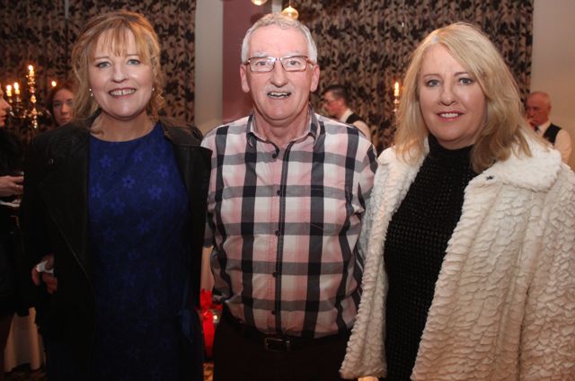 Martina Ryan, Jimmy Diggin and Carmelita Ryan at the Tralee Imperials fundraising fashion show at the Fels Point Hotel on Friday night. Photo by Dermot Crean