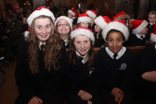 Blennerville NS pupils Katie Moriarty, Aoife Bourke, Keelin O'Brien and Caoimhe Dairo at the beginning of their Christmas Concert at St John's on Tuesday. Photo by Dermot Crean