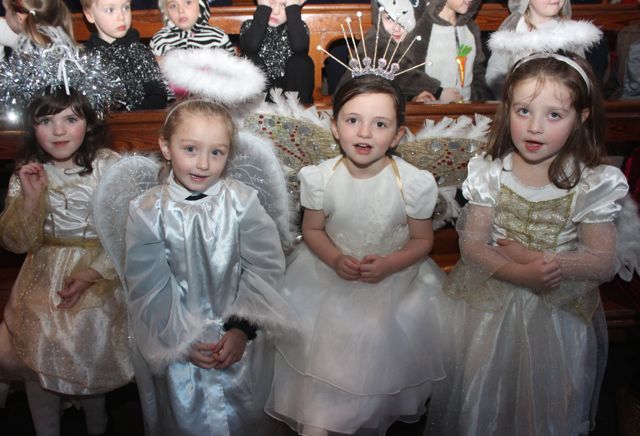 Little angels Saoirse O'Connor, Naomi Wrzodak, Polly Jones and Olivia Crean before the start of the Blennerville NS Christmas Concert on Tuesday night in St John's Church. Photo by Dermot Crean