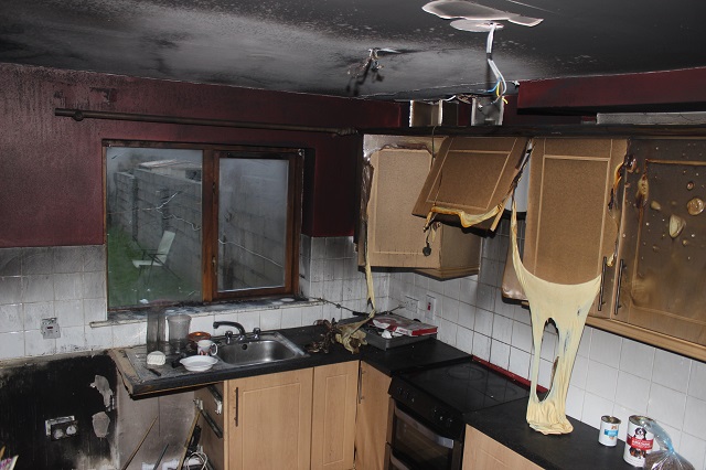 The damage caused to the kitchen after the dishwasher fire. Photo by Gavin O'Connor. 